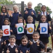 A flashback to staff and pupils at St Benet's Primary School, celebrating after being rated Good by Ofsted. Picture: St Benet's Primary School