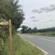 The road was closed from the public footpath sign to the layby at the Horseshoes pub following the fatal crash