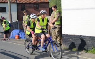 Para athlete Sarah Wilby and her guide Sue, in the Beccles Triathlon