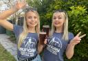 Modelling the Bungay Beer Festival 2023 t-shirts are Sophie Pearson (left) and Ella-Rose Harrison-Reeve (right)