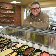 Business owner Ian Smith with the homemade ice creams he has on sale