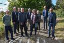David Bland, Paul Gurbutt, Adrian Crockett, Norman Brooks, Jon Smith, Wendy Summerfield, Sheila Smith, Steve Larkin and Dave Howson, trustees of the Worlingham Community Facility, at the site of the former Worlingham Primary School where Worlingham