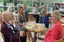 Halesworth Volunteers were been honoured with the Queen's Award for Voluntary Service in 2022, seen pictured in the old Halesworth Co-op cafe