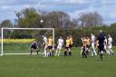 Beccles in action during their 2-1 win at Scole which guaranteed promotion. Picture: David Walters
