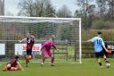 Having left defenders in his wake, Charlie McAra slots home Bungay's second goal on Saturday. Picture: Shaun Cole