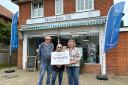 Bosses at Bungay Community Support celebrate the funding