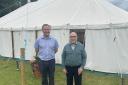 David Delaney (left) and Arthur Leeks, 90, (right) in front of the tent where they hold Gospel sessions