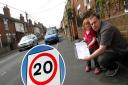 Picture of Nathan Fox, Denmark Road resident in Beccles with the petition he started to slow traffic, pictured with his daughter Demi Fox in 2009