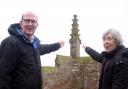 Church secretary and fabric officer Simon Wilkin (left) and the churchwarden Sally Ellson (right) pictured with the fractured pinnacle behind them