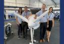 From left, NEBOair's Kerry Wilmot and Adam Hammett and SaxonAir''s John Dewing and Rebekah Hill at Farnborough International Airshow 2022 flanking a Pipistrel Velis Electro