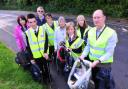 Former town mayor Hugh Taylor, with former mayor Caroline Topping, volunteers and students from Sir John Leman High School take part in a litter pick around the town.