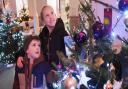 Summer Stephens, eight, and her brother Ellis, four, study the tree by the New Life Fellowship at the Hungate Church Christmas tree festival in Beccles. Picture: DENISE BRADLEY