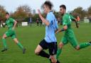 Jack Child heads for goal in Saturday\'s game at Martham.