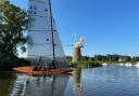 Snark sails past the historic mill at How Hill on the River Ant on the Norfolk Broads