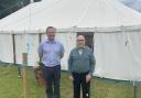 David Delaney (left) and Arthur Leeks, 90, (right) in front of the tent where they hold Gospel sessions