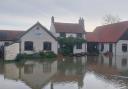 Rising water on Monday has left the Geldeston Locks Inn out of action throughout the week. Staff have said they will bounce back. Picture - The Locks Inn Community Pub
