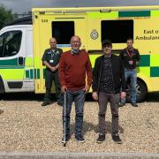 Father and son Peter and Paul Ellis, centre, visited the Waveney Ambulance Depot to thank the life-savers who pull them from a car crash on the A146.