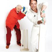 Cricketing legend Graeme Swann (right) and Henry Blofeld