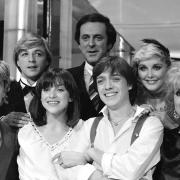 National treasure and Eurovision commentator Terry Wogan pictured with 1981 winners Bucks Fizz and 1982 entry Bardo. Picture: PA Wire