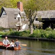 People boating on the River Stour in Flatford, Babergh