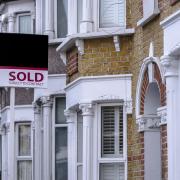 British houses with sold sign