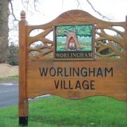 The Worlingham village sign.