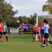 Acrobatics from the Thorpe goalkeeper as Bungay launch another attack.