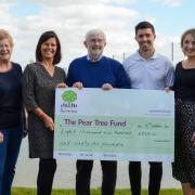 Trustee Jane Edwards, Pear Tree Centre manager Seva Newick, treasurer and organiser Ted Edwards, golf professional at Halesworth Golf Club Richard Davies and Ellie Andrews, assistant general manager at Halesworth Golf Club.