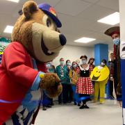 Woody Bear cuts the ribbon at James Paget University Hospital\'s new paediatric emergency department.