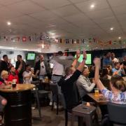 Fans celebrate England scoring at Chinny's in Halesworth