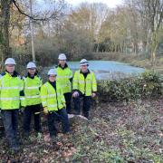 UK Power Networks staff volunteered their time to help keep Great Crested News happy at a Halesworth pond