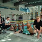 Swimming stars, including Jordan Catchpole, front right, with Swimathon participants