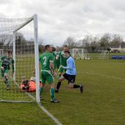 Alex Shreeve turns away after regaining the lead for Bungay against Holt on Saturday. Picture: Shaun Cole