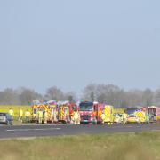 Emergency services at the scene of the crash at Beccles Airfield on March 24, 2022