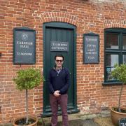 Business owner Jason Collins outside of Earsham Hall Tearoom, Norfolk