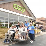 Smiling faces all around at the official grand reopening of the new look Halesworth Co-op