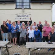 Rumbugh Buck drinkers outside the 2023 CAMRA Pub of the Year