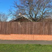 The council vehemently object to the fence - demanding it be reduced to one metre or removed