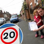 Picture of Nathan Fox, Denmark Road resident in Beccles with the petition he started to slow traffic, pictured with his daughter Demi Fox in 2009